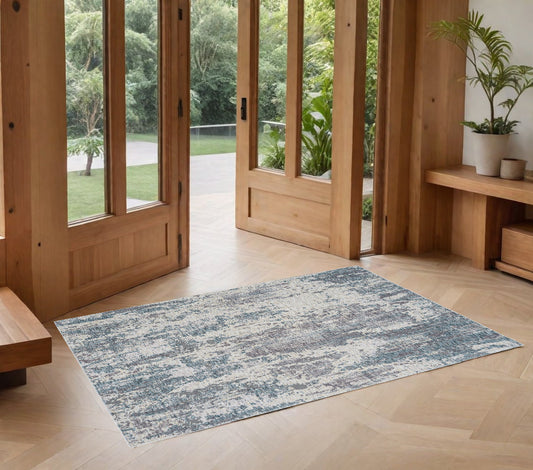 2' x 3' Gray and Ivory Abstract Area Rug