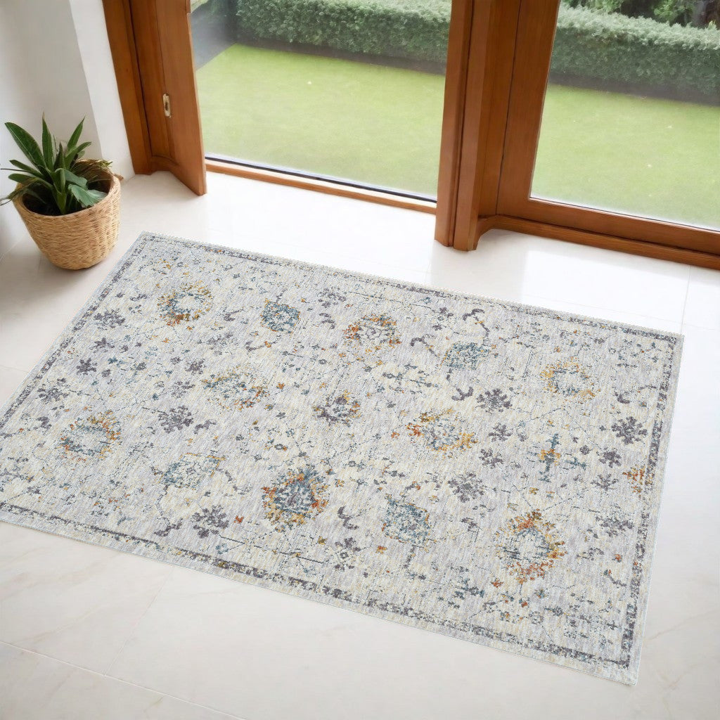 2' x 3' Ivory and Blue Floral Area Rug