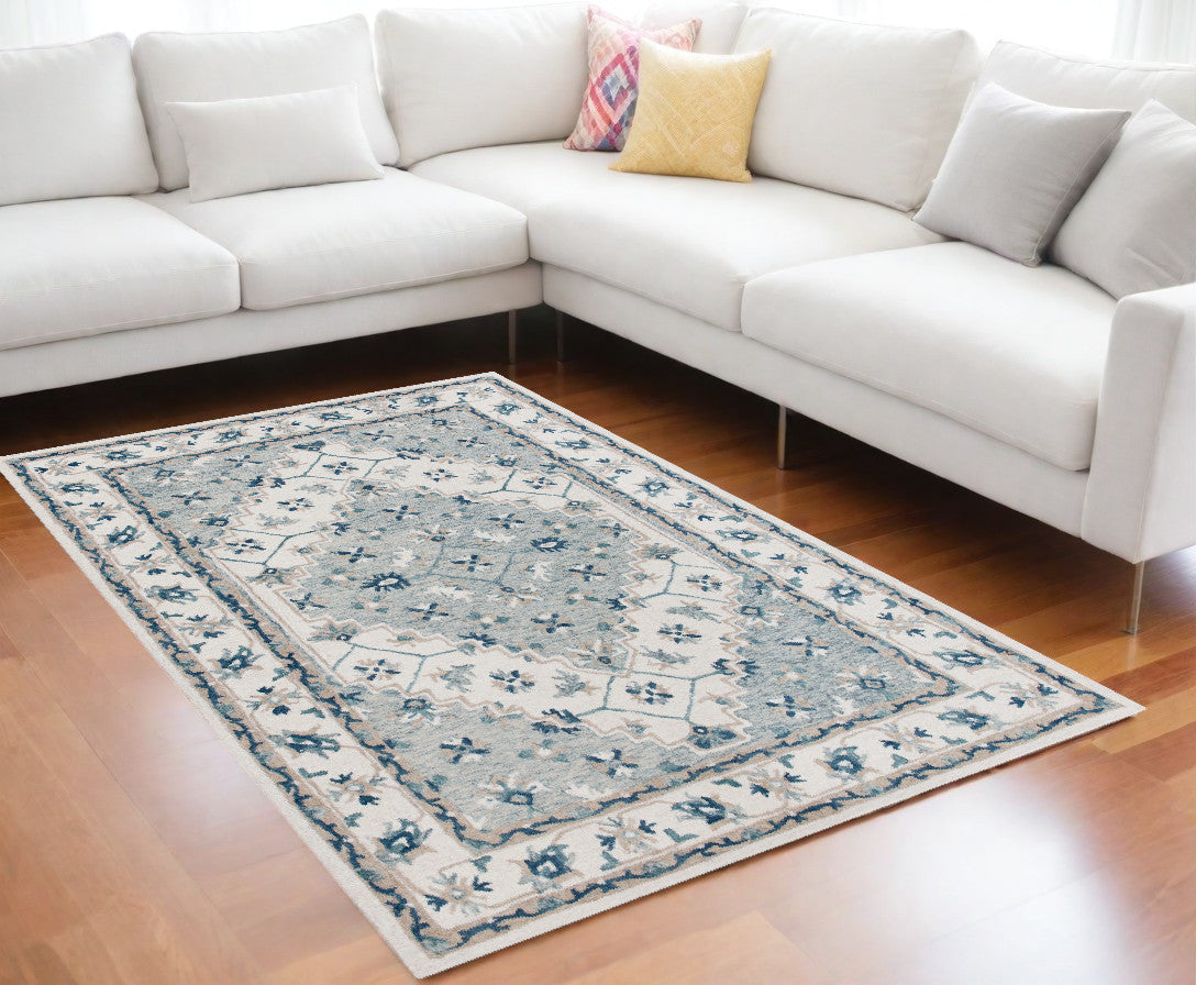 8' x 10' Blue and Ivory Wool Floral Hand Tufted Area Rug