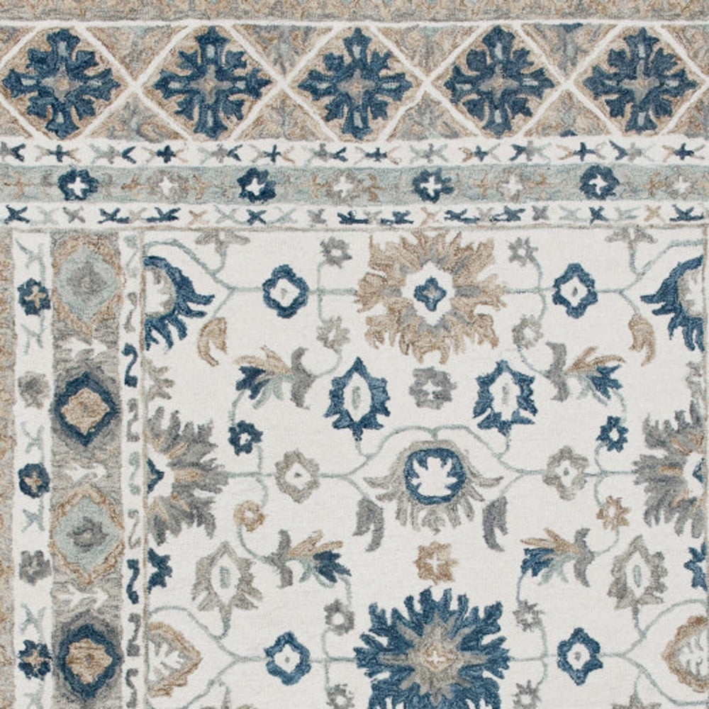 8' x 10' Blue and Ivory Wool Floral Hand Tufted Area Rug