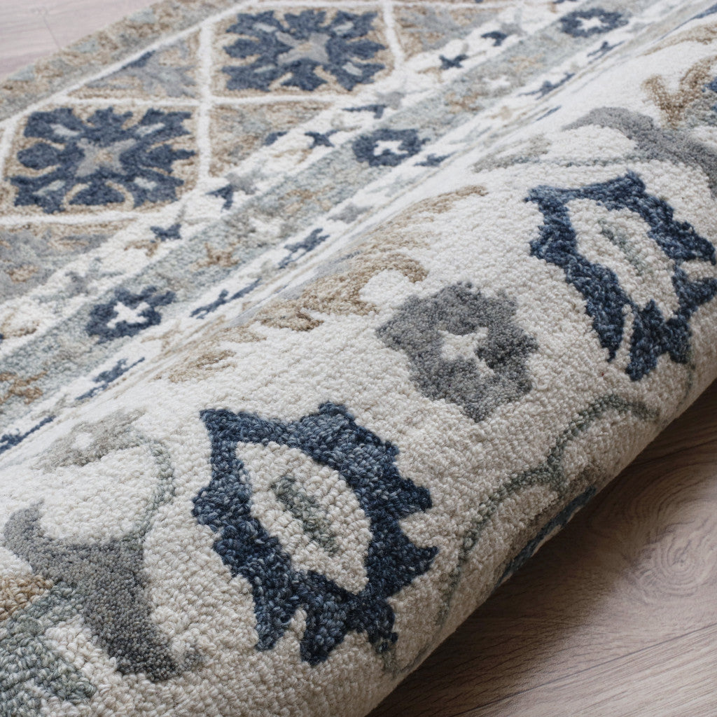 8' x 10' Blue and Ivory Wool Floral Hand Tufted Area Rug