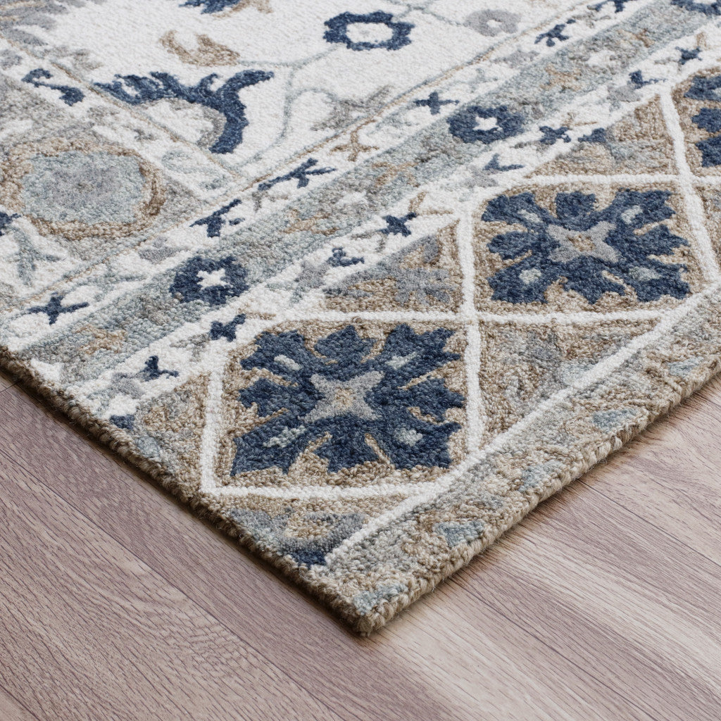 8' x 10' Blue and Ivory Wool Floral Hand Tufted Area Rug