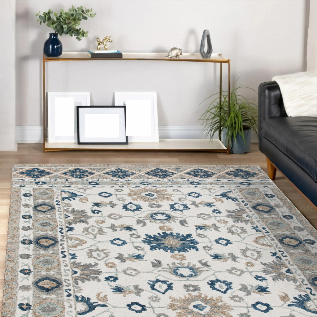 8' x 10' Blue and Ivory Wool Floral Hand Tufted Area Rug