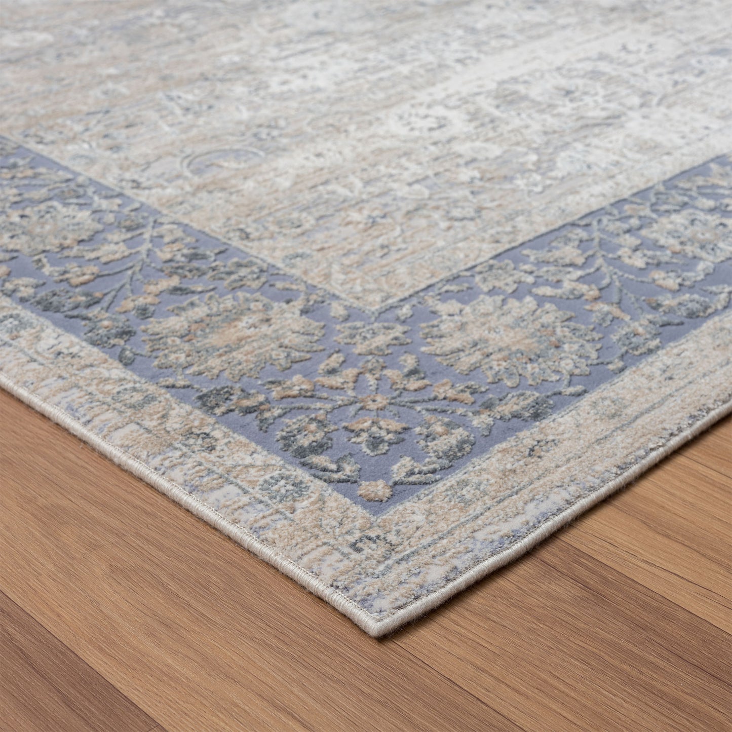 5' x 8' Blue and Beige Floral Area Rug