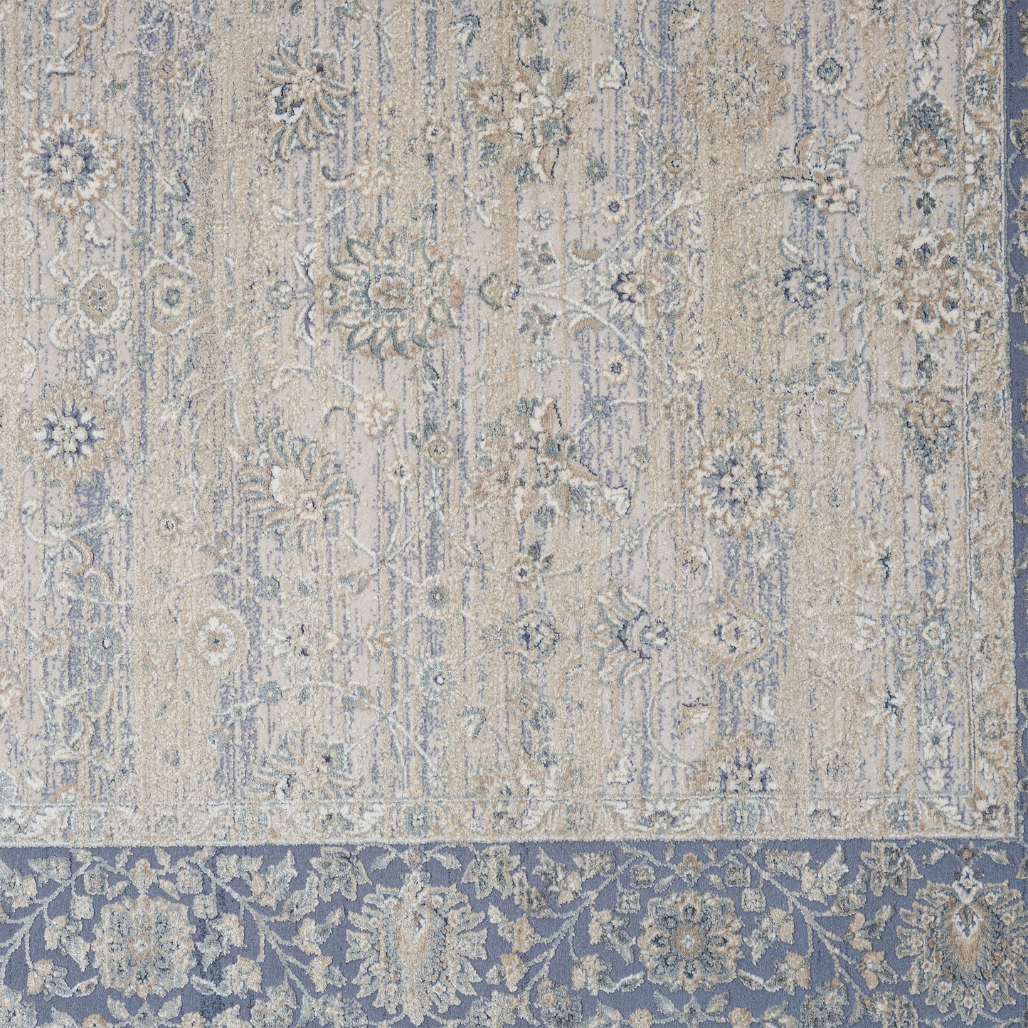 5' x 8' Blue and Beige Floral Area Rug