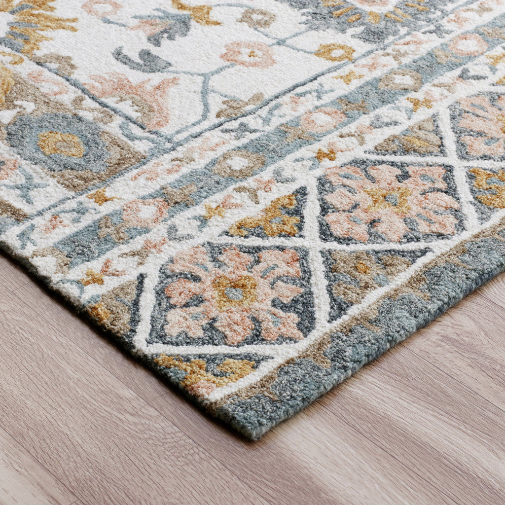 5' x 8' Blue and Ivory Wool Floral Hand Tufted Area Rug