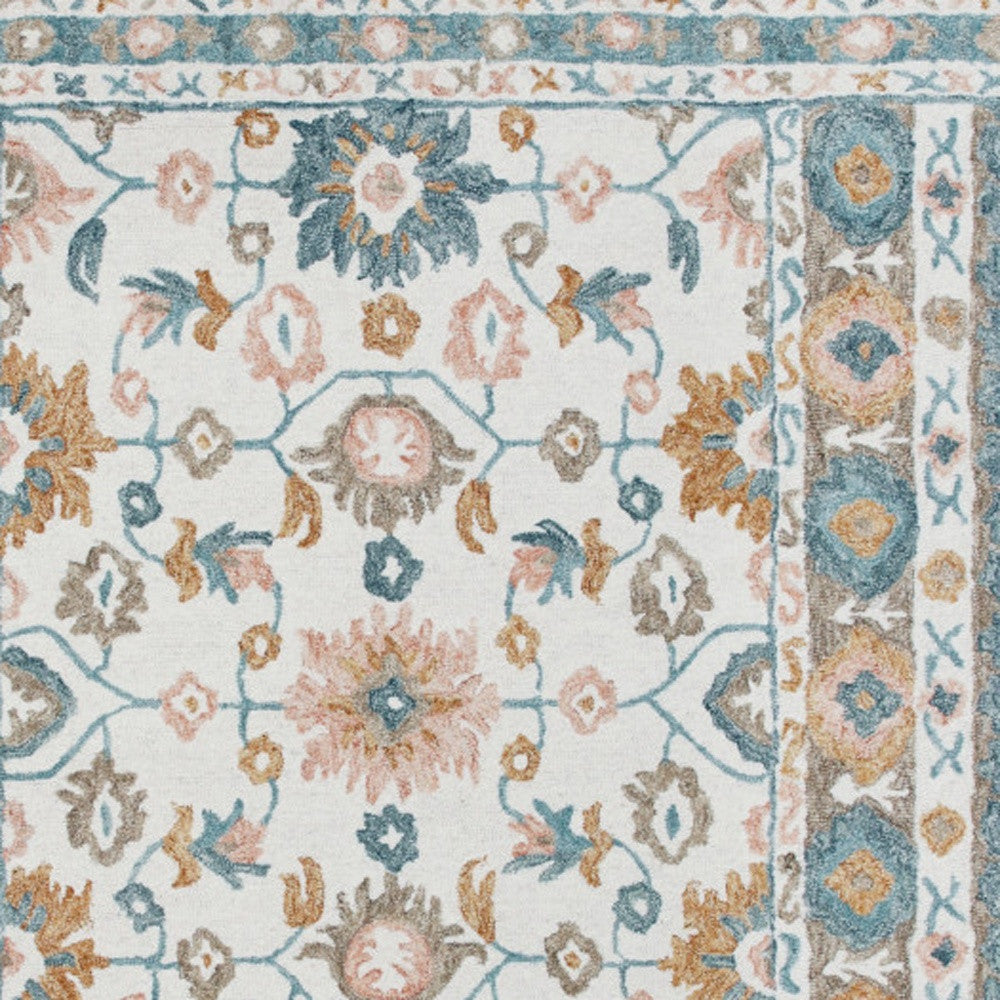 5' x 8' Blue and Ivory Wool Floral Hand Tufted Area Rug