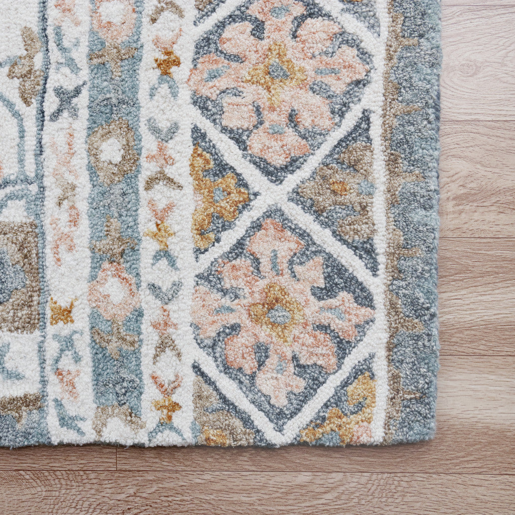 5' x 8' Blue and Ivory Wool Floral Hand Tufted Area Rug