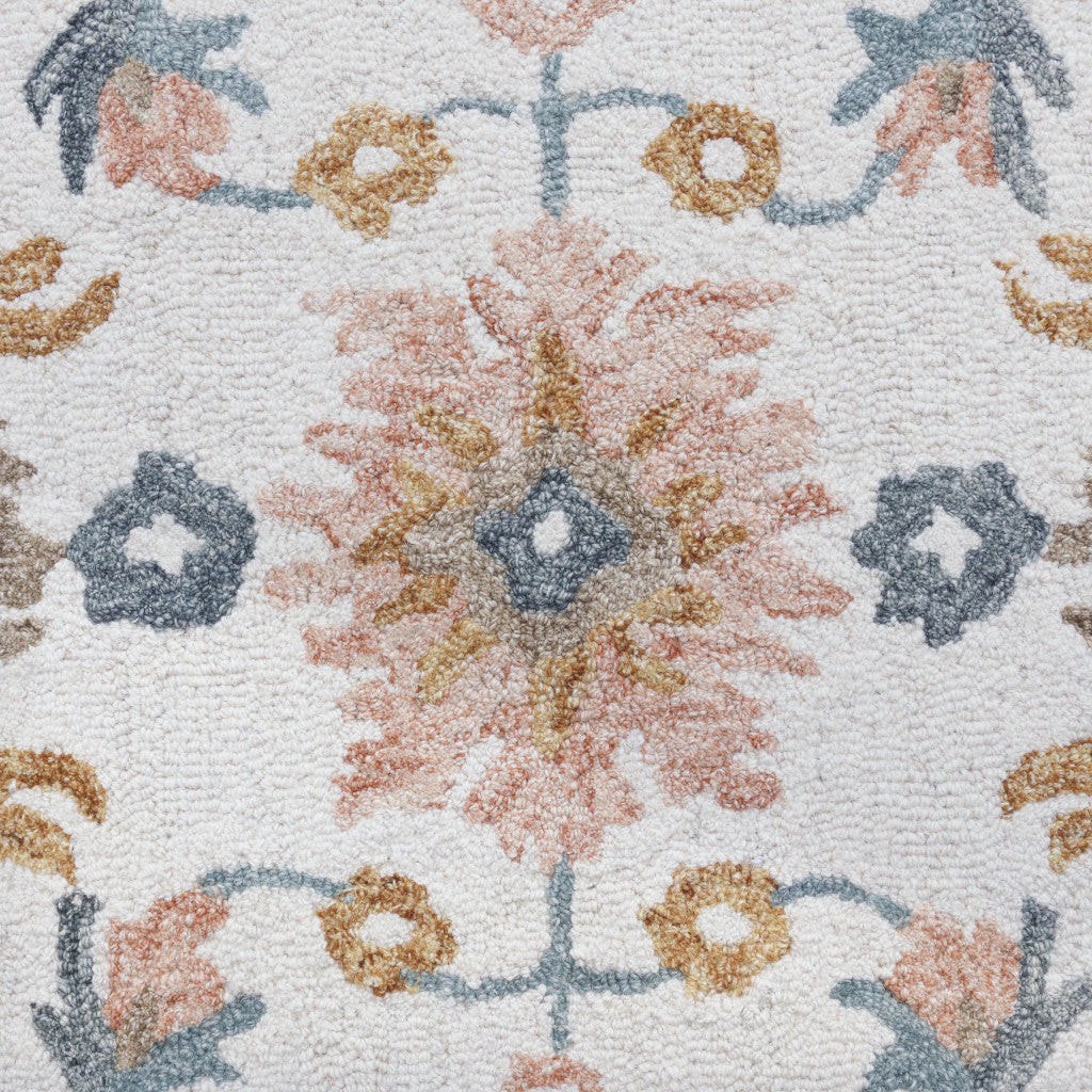 5' x 8' Blue and Ivory Wool Floral Hand Tufted Area Rug