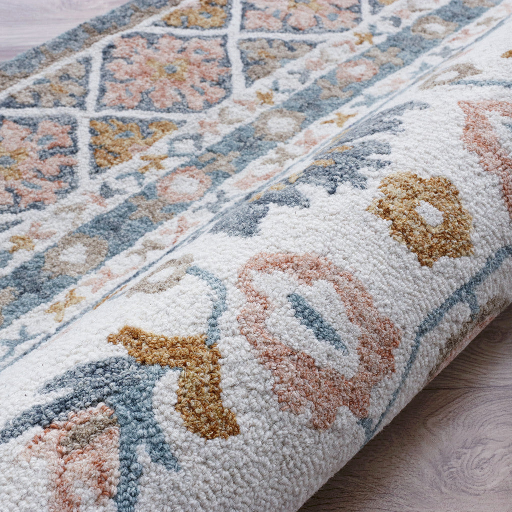 5' x 8' Blue and Ivory Wool Floral Hand Tufted Area Rug