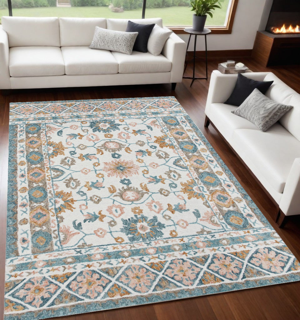 5' x 8' Blue and Ivory Wool Floral Hand Tufted Area Rug