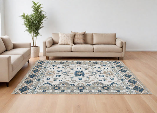 9' x 12' Blue and Ivory Wool Floral Hand Tufted Area Rug