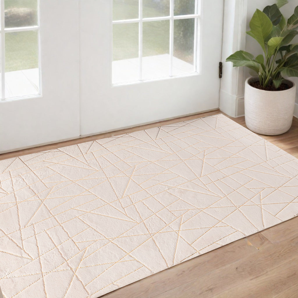 2' x 3' Beige and Gold Faux Fur Abstract Shag Non Skid Area Rug