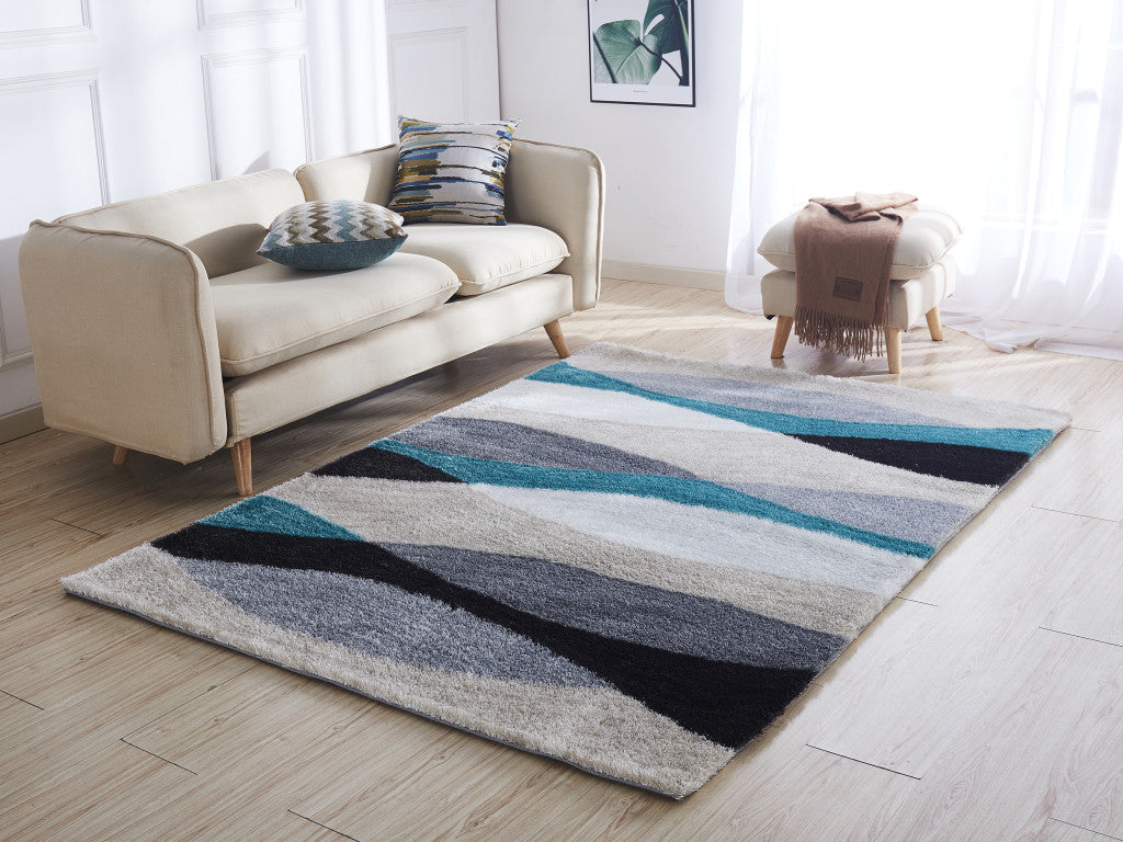 5' x 7' Gray Black and Blue Shag Hand Tufted Area Rug