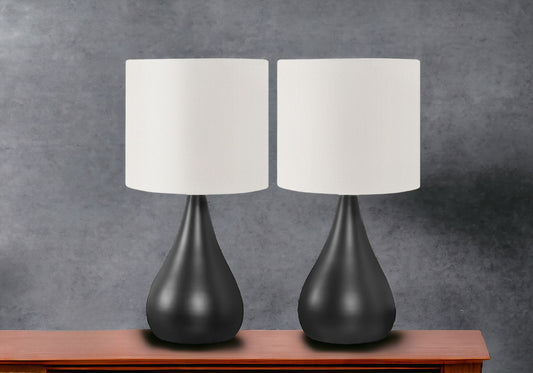 Set of Two 18" Black Metal Round Table Lamps With Ivory Drum Shades