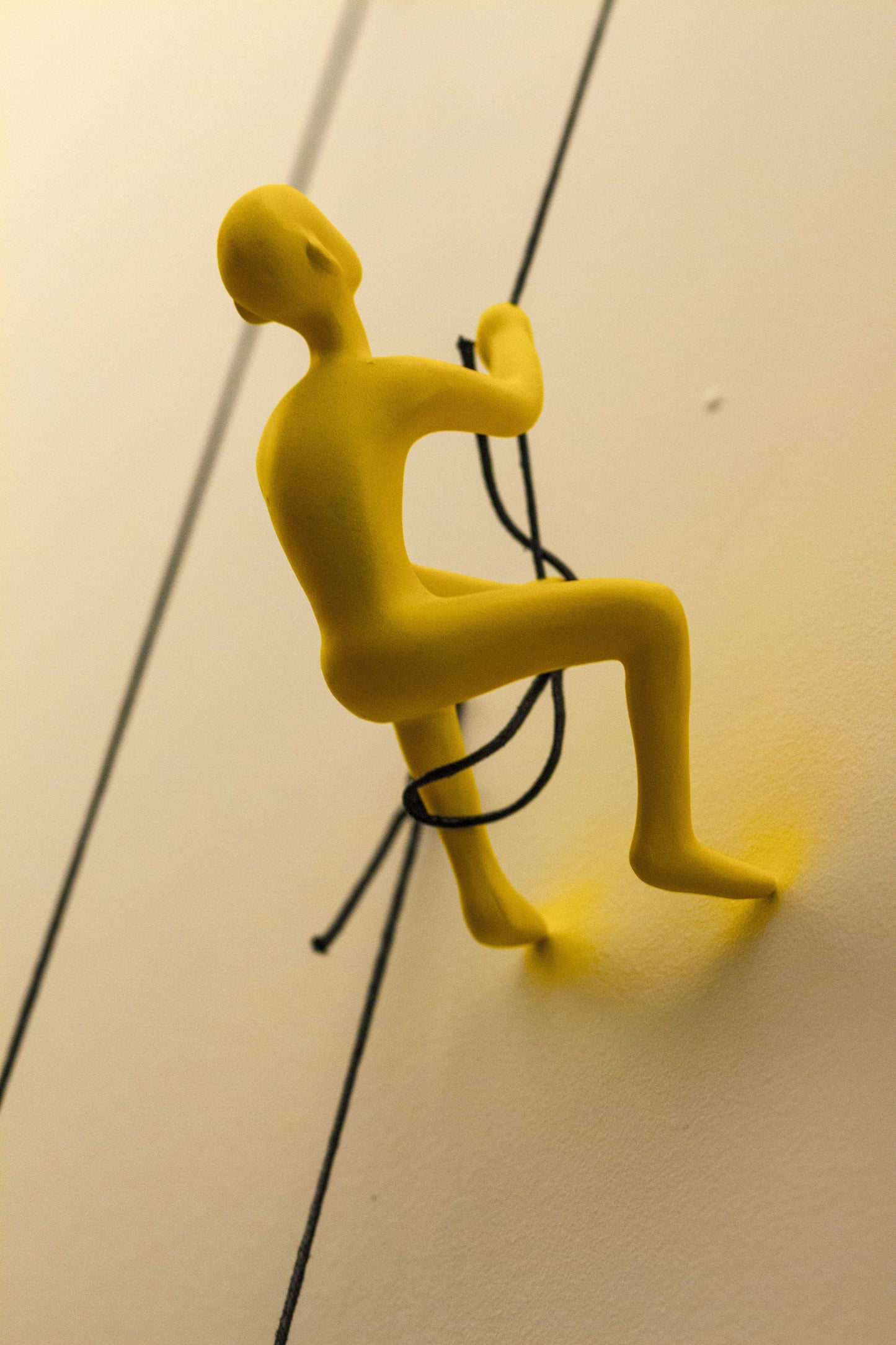 6" Yellow Unique Climbing Man Wall Art