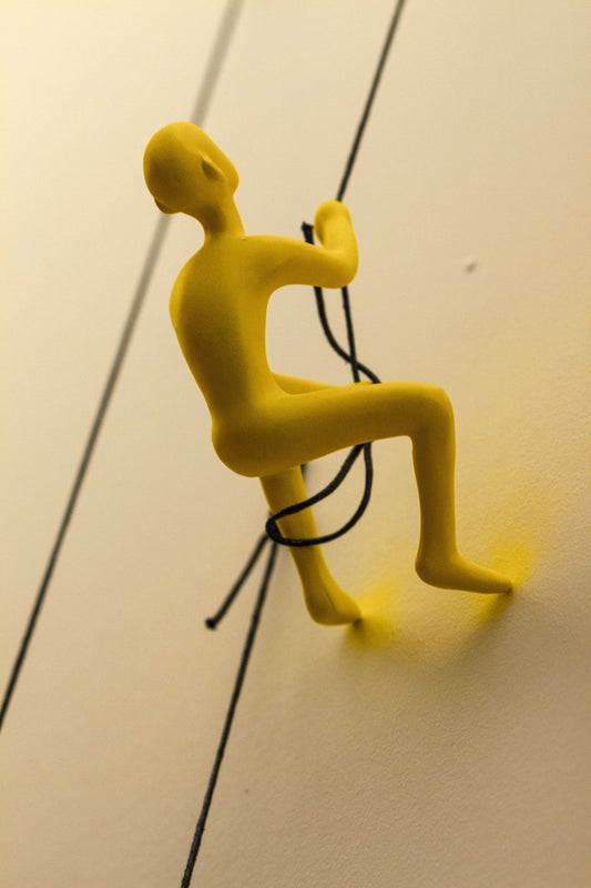 6" Yellow Unique Climbing Man Wall Art