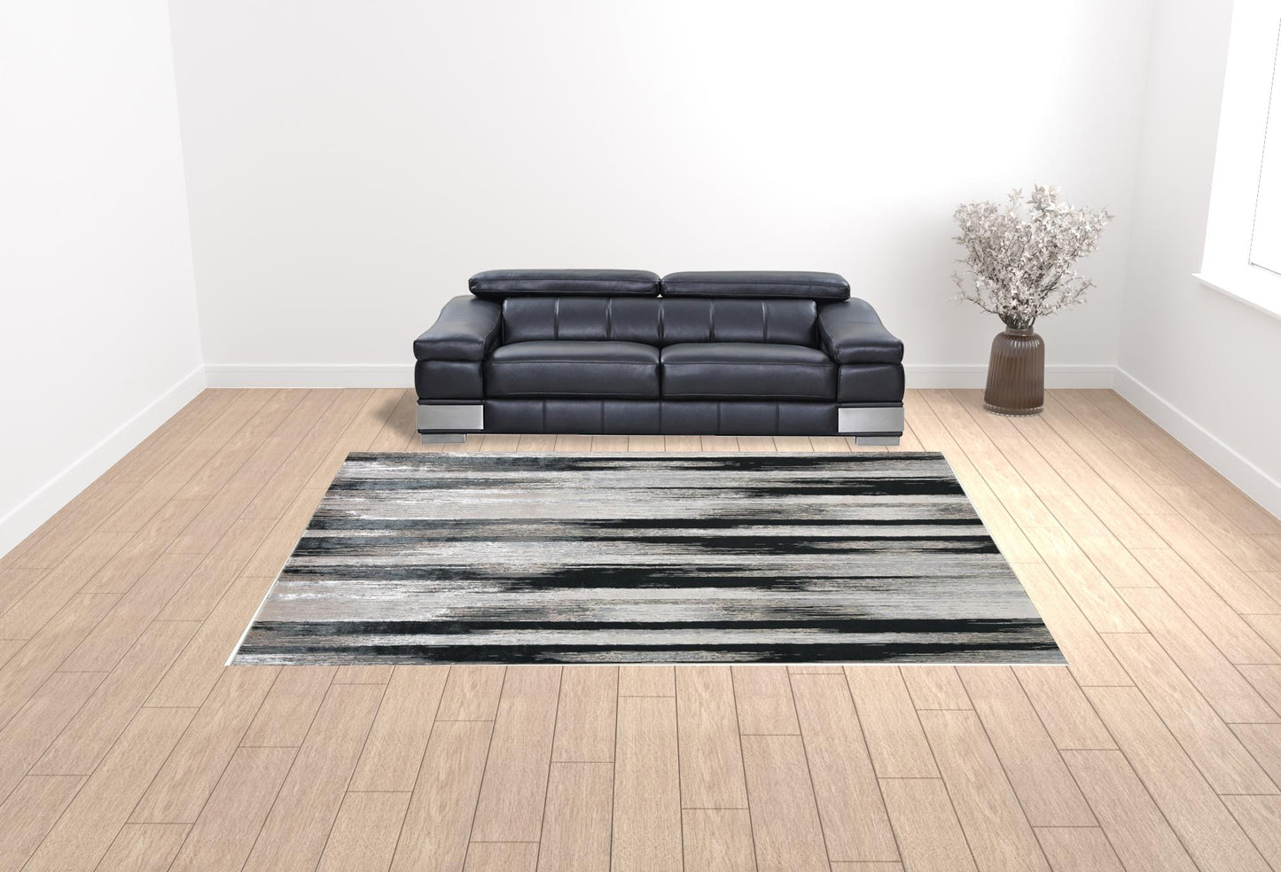 10' x 13' Beige and Black Abstract Power Loom Area Rug