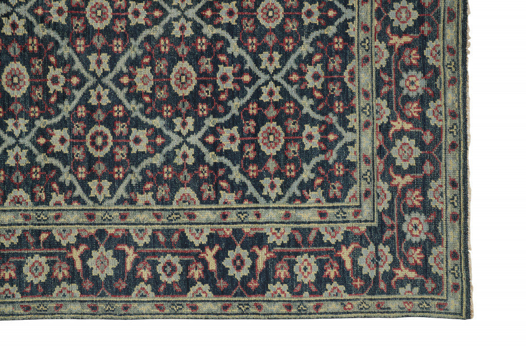 10' X 13' Blue Green And Red Wool Floral Hand Knotted Distressed Stain Resistant Area Rug With Fringe