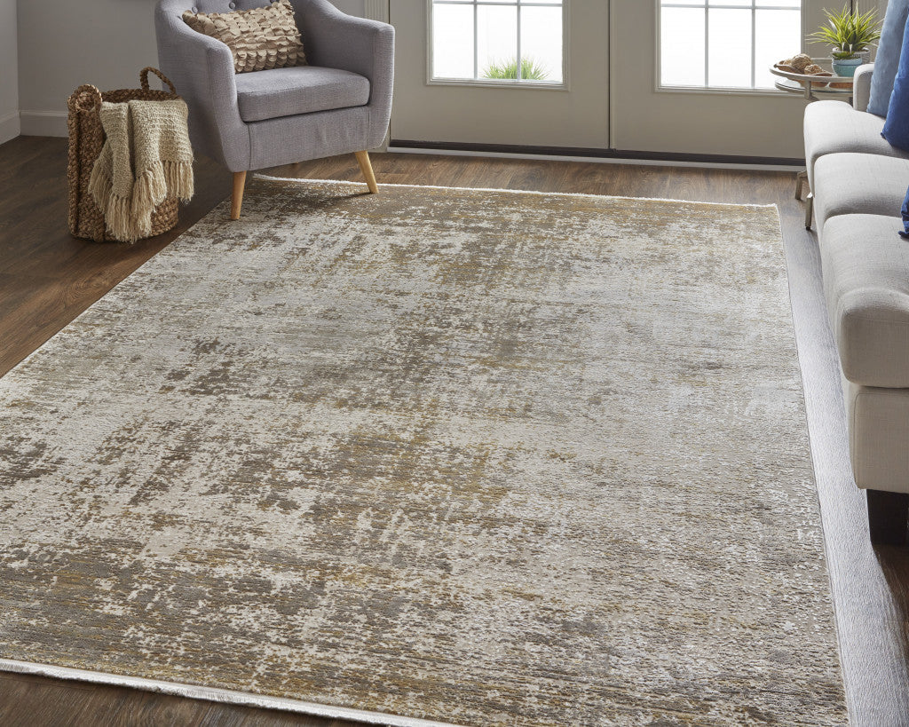 Taupe Ivory And Gold Abstract Power Loom Distressed Area Rug