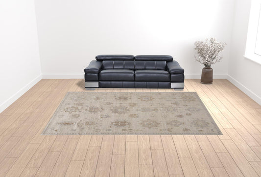 10' X 14' Tan And Brown Floral Hand Knotted Stain Resistant Area Rug