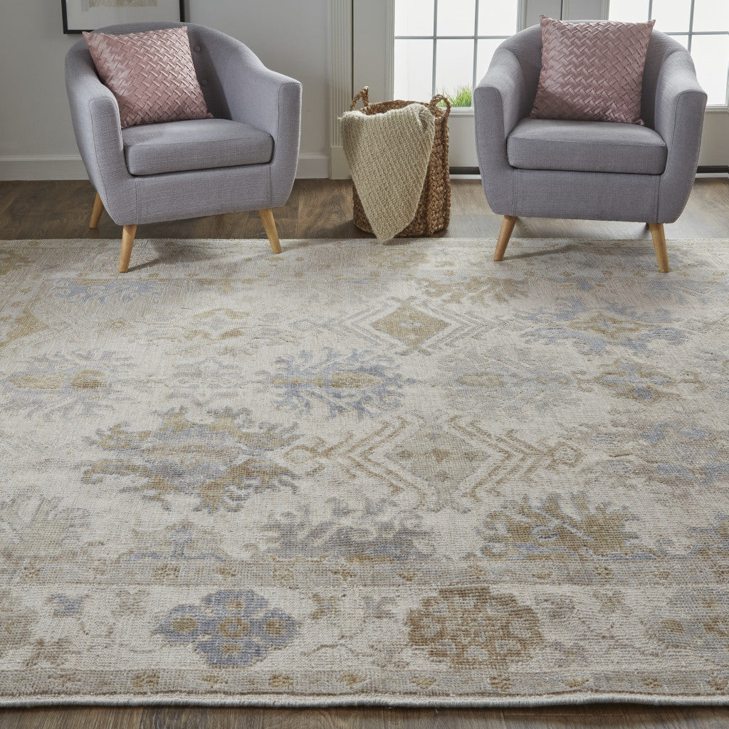 9' X 12' Ivory Tan And Blue Floral Hand Knotted Stain Resistant Area Rug
