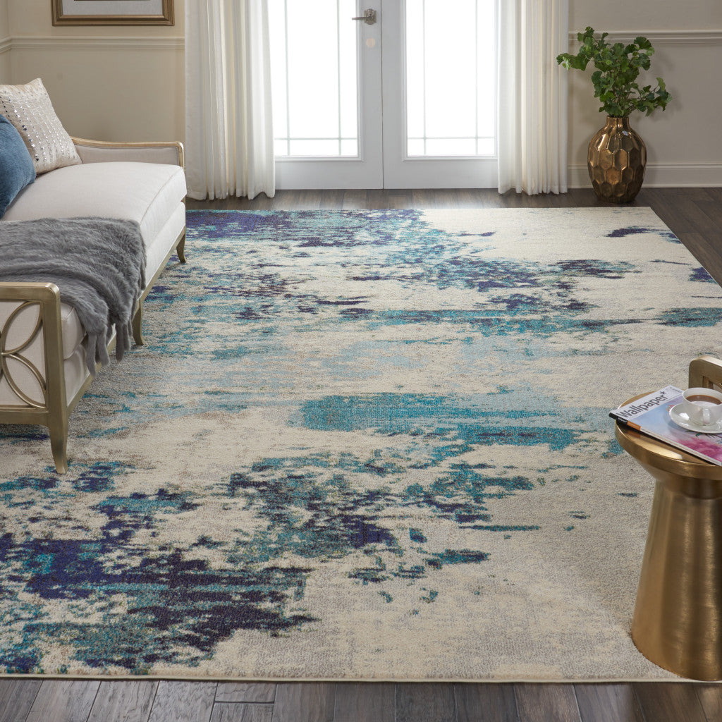 9' x 12' Ivory Abstract Power Loom Area Rug