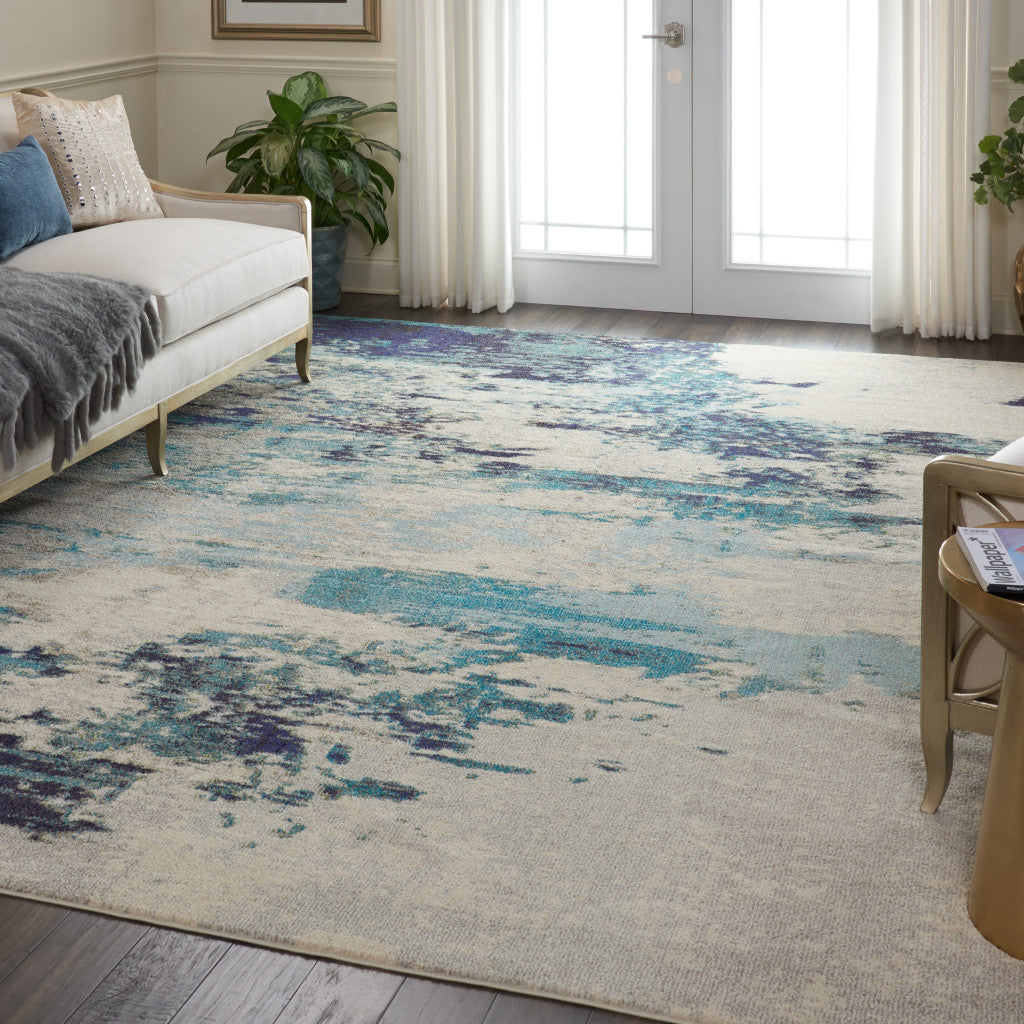 9' x 12' Ivory Abstract Power Loom Area Rug