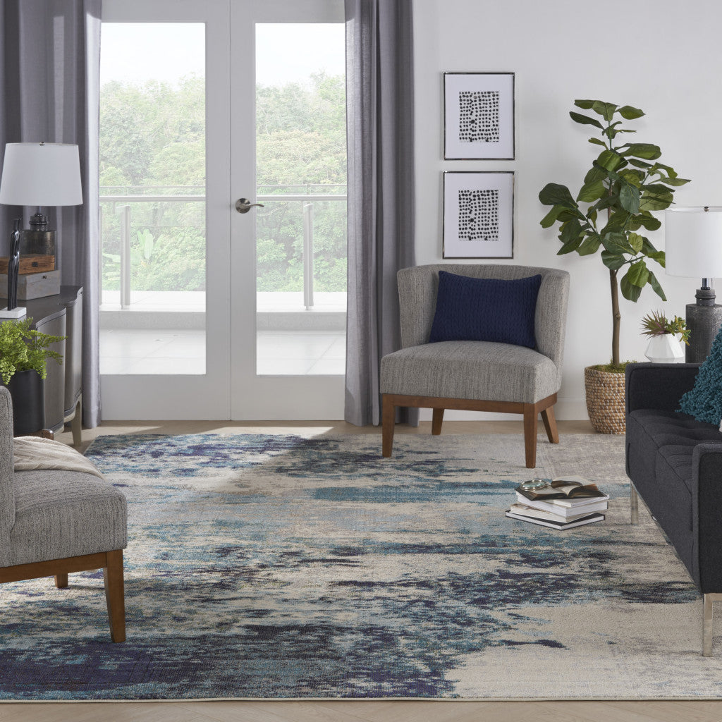 10' x 14' Ivory Abstract Power Loom Area Rug