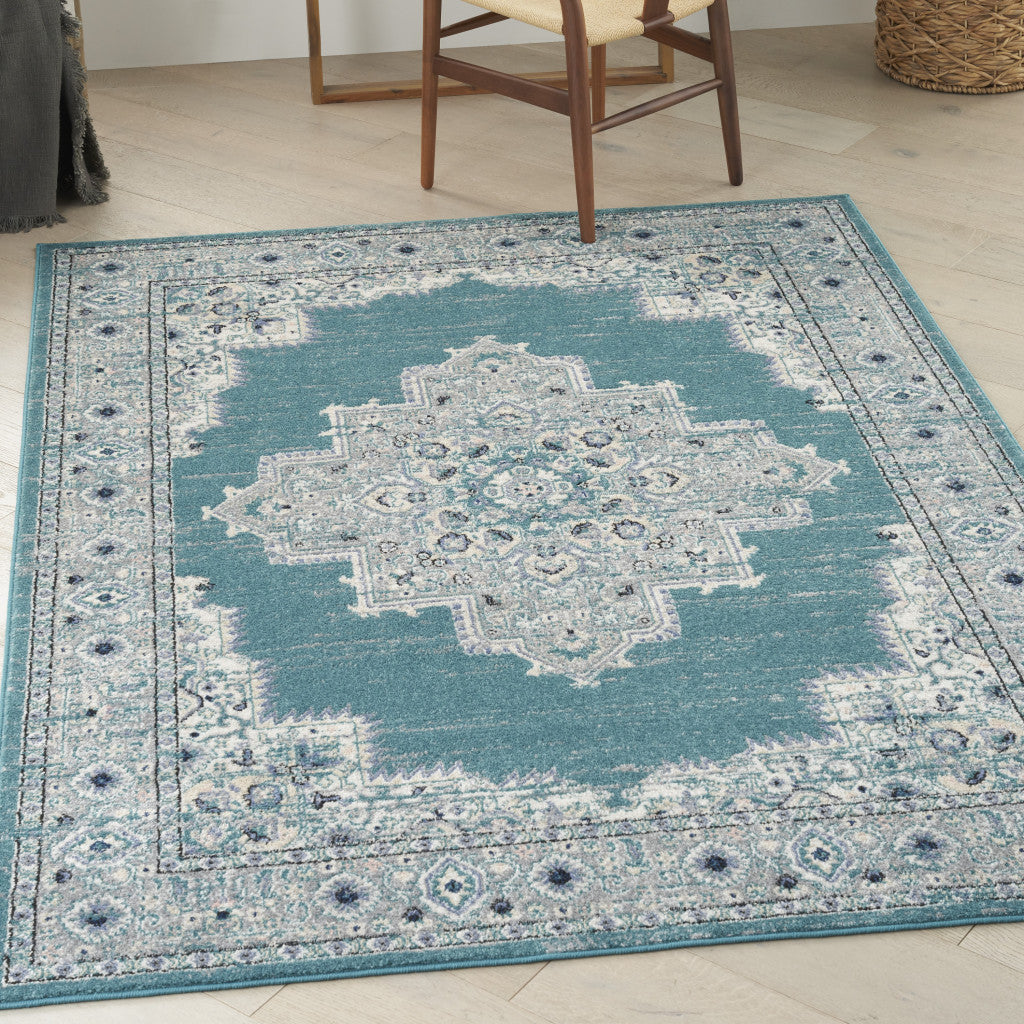 5' x 7' Aqua Floral Power Loom Distressed Area Rug