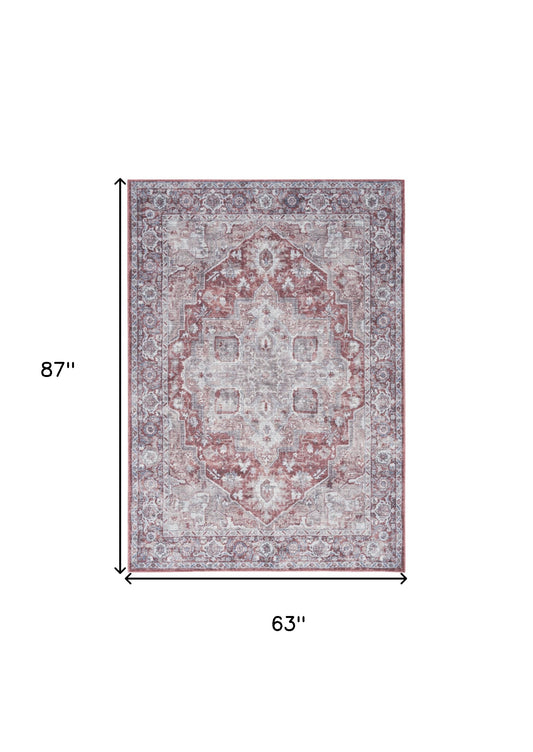 5' X 7' Blue And Pink Floral Power Loom Distressed Washable Area Rug