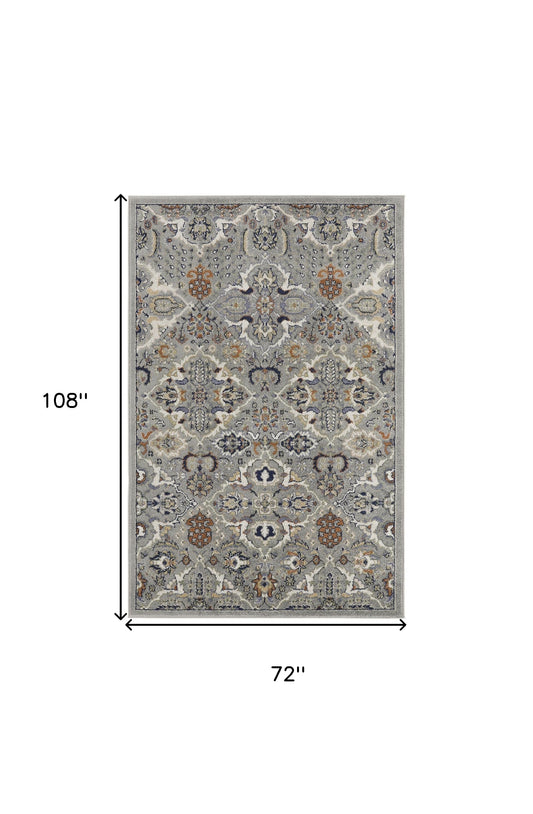 6' x 9' Green and Ivory Floral Power Loom Area Rug