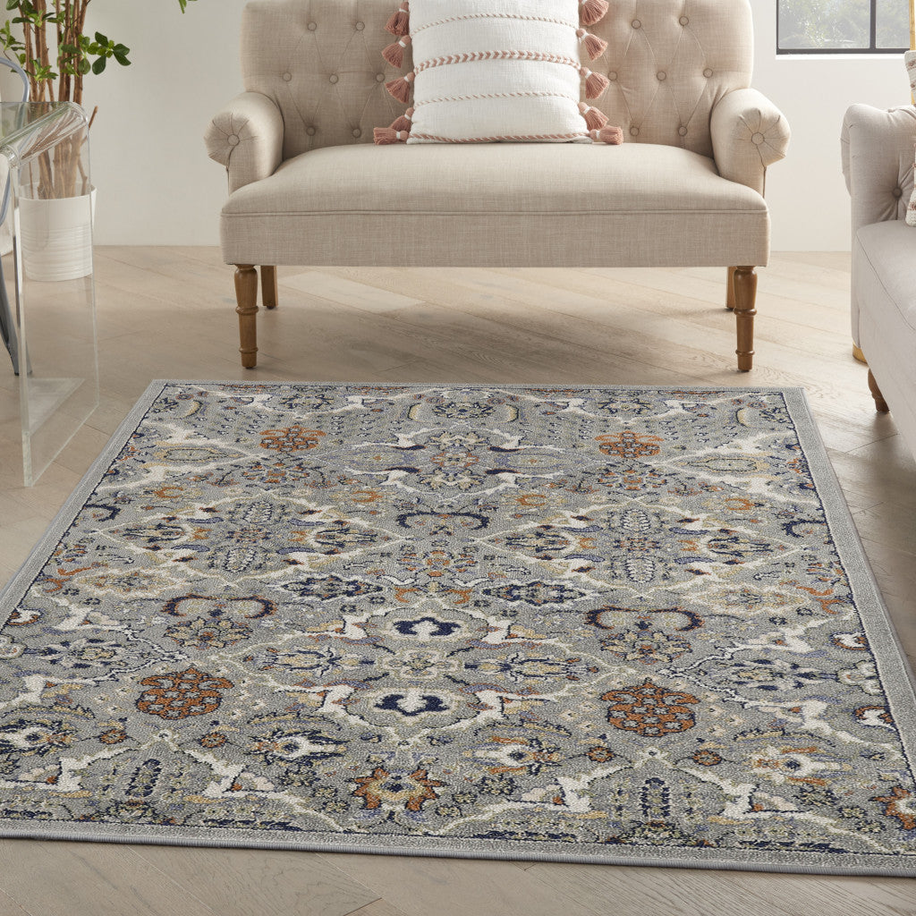 4' x 6' Green and Ivory Floral Power Loom Area Rug