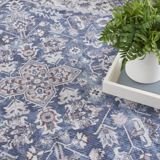 5' x 7' Gray Ivory and Blue Floral Power Loom Distressed Washable Area Rug