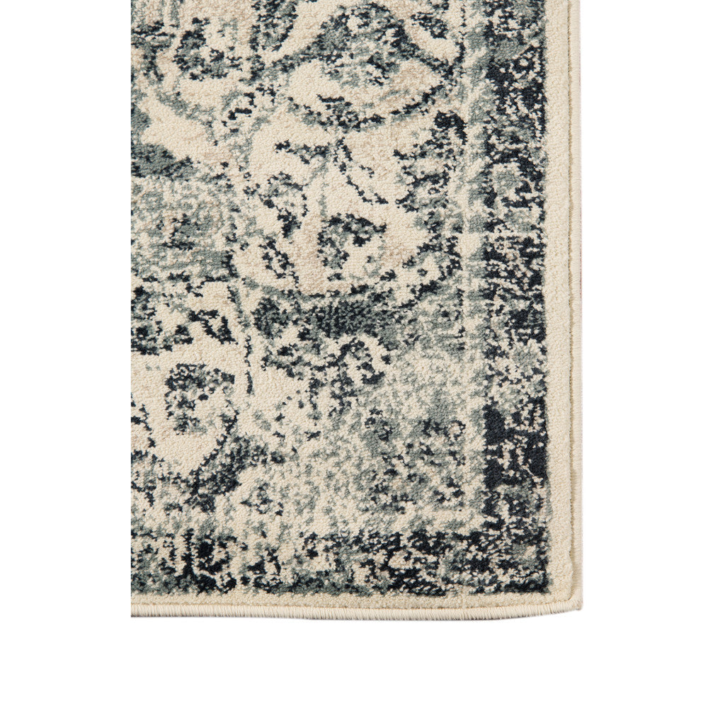 5' x 8' Beige and Blue Medallion Power Loom Area Rug