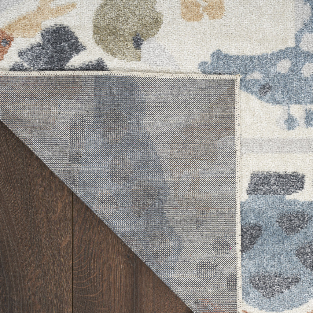 5' x 7' Ivory Blue and Gray Animal Print Washable Area Rug