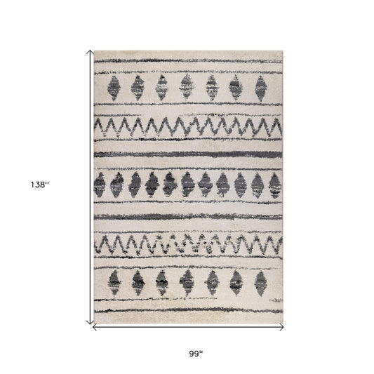 8' x 11' Ivory and Black Geometric Shag Area Rug