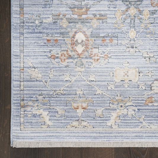 8' x 10' Blue and Ivory Oriental Power Loom Distressed Area Rug With Fringe