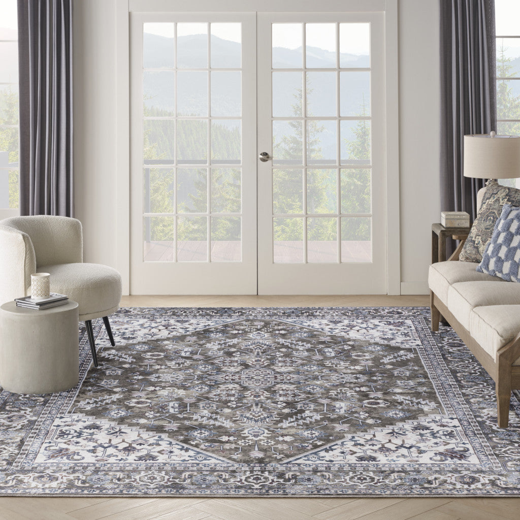 9' x 12' Green and Ivory Floral Power Loom Distressed Washable Area Rug
