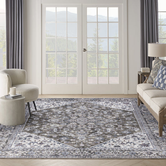 9' x 12' Green and Ivory Floral Power Loom Distressed Washable Area Rug