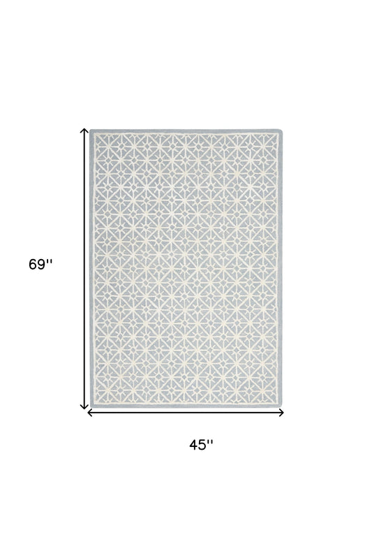 4' x 6' Light Blue and White Geometric Hand Tufted Area Rug