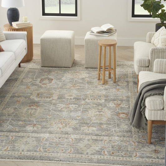 5' x 8' Beige Ivory and Gray Oriental Power Loom Distressed Area Rug With Fringe