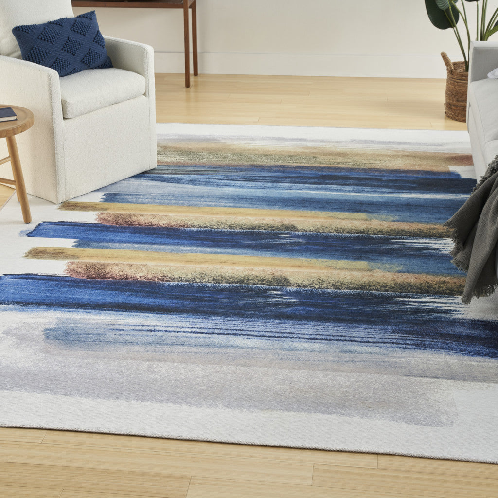 8' x 10' Ivory and Blue Abstract Power Loom Washable Non Skid Area Rug