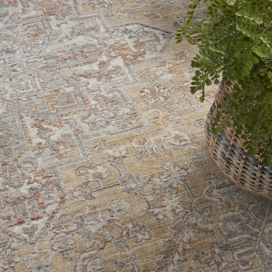 5' x 8' Gray and Gold Oriental Power Loom Distressed Area Rug With Fringe