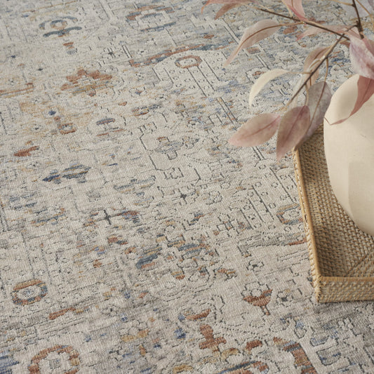 8' x 10' Ivory Blue and Orange Oriental Power Loom Distressed Area Rug With Fringe