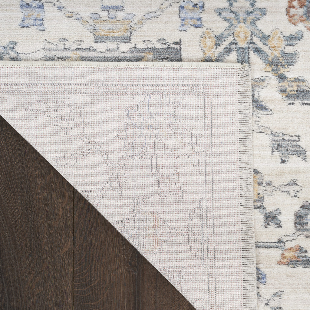 8' x 10' Ivory and Gray Oriental Power Loom Distressed Area Rug With Fringe