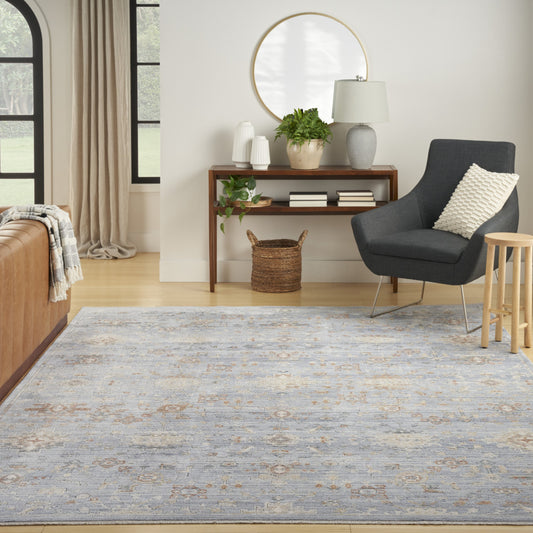 5' x 8' Blue and Ivory Oriental Power Loom Distressed Area Rug With Fringe