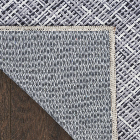 6' x 9' Gray and Ivory Abstract Power Loom Washable Non Skid Area Rug