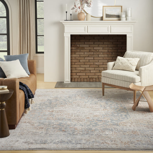 8' x 10' Ivory and Blue Oriental Power Loom Distressed Area Rug With Fringe