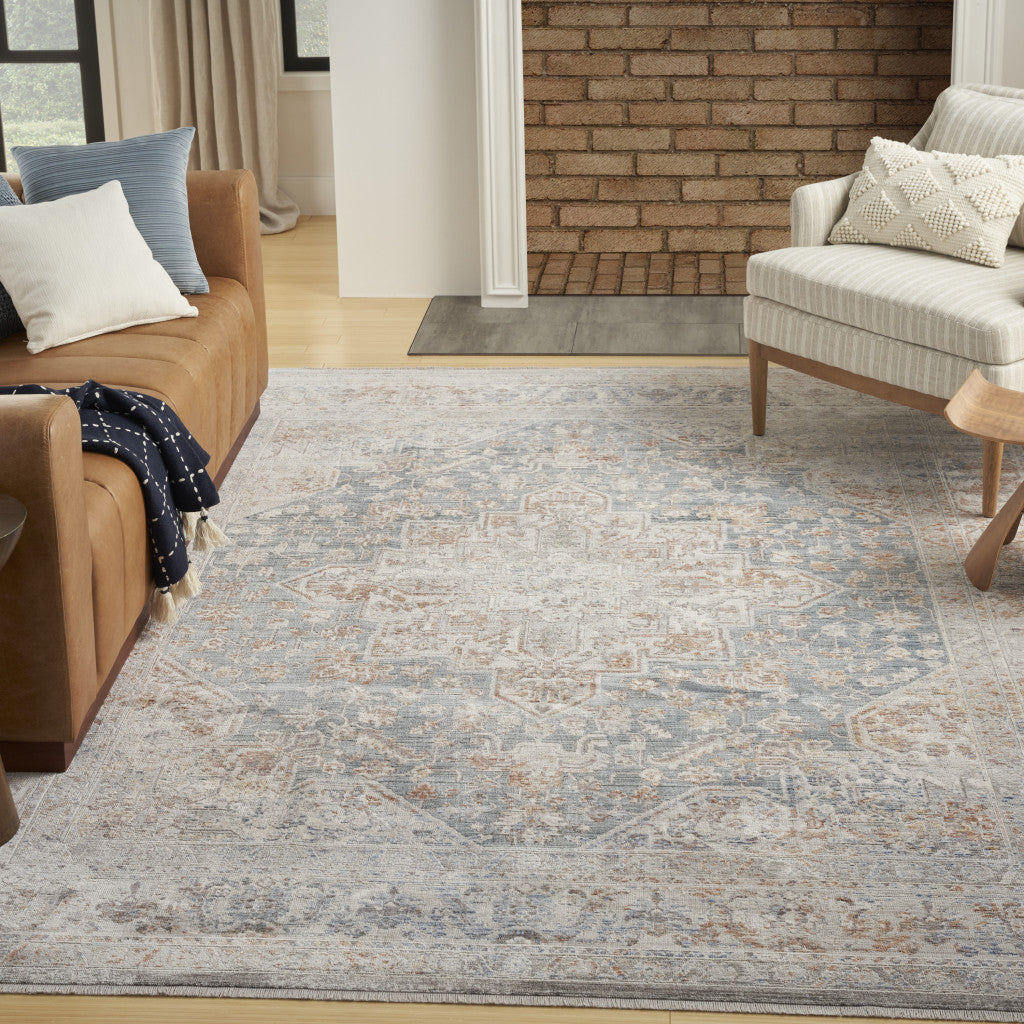 8' x 10' Ivory and Blue Oriental Power Loom Distressed Area Rug With Fringe